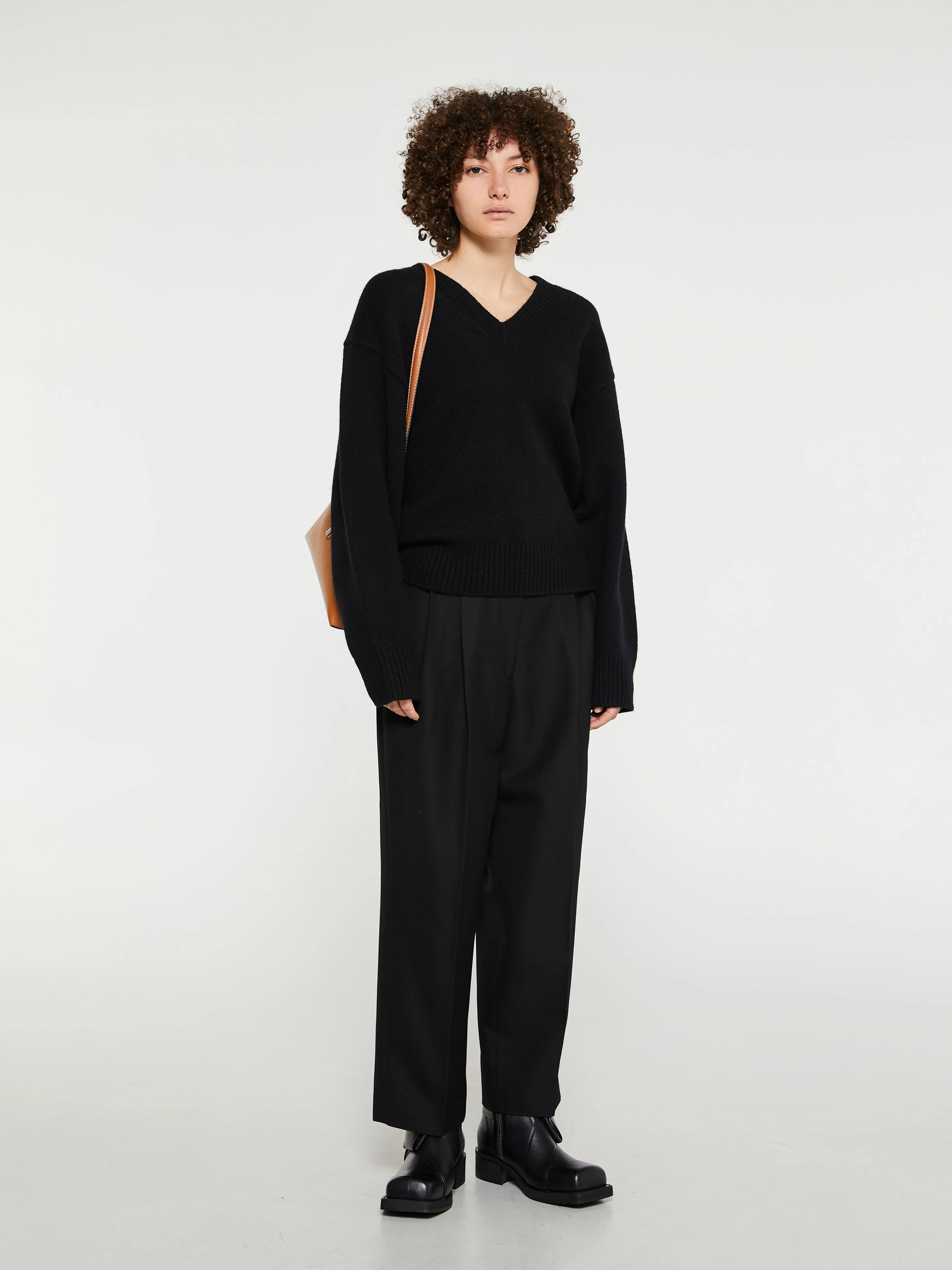 Double-Pleated Cropped Trousers in Black