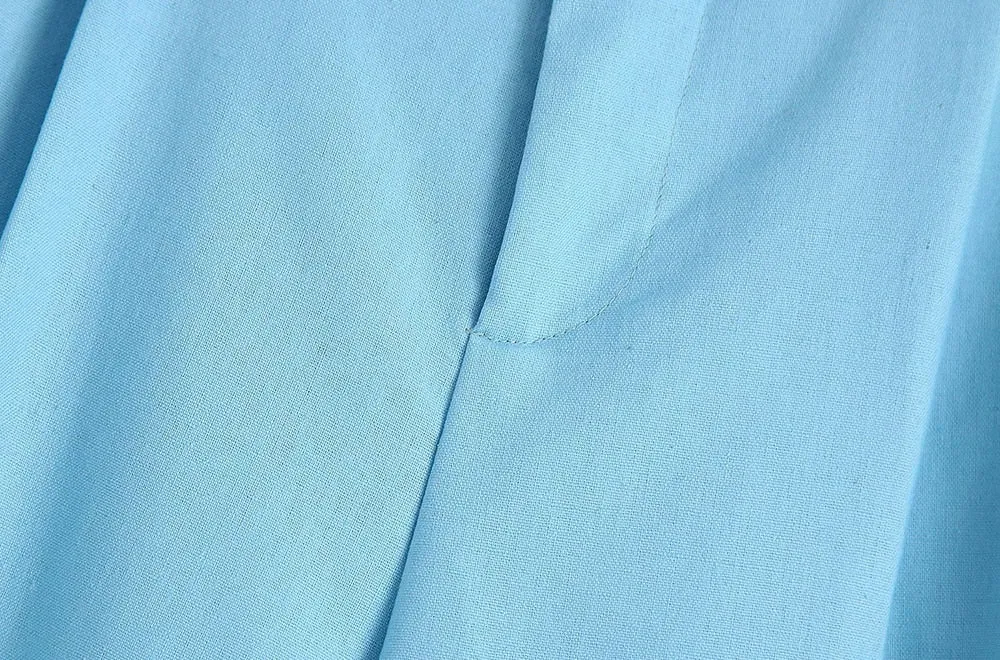 WIDE-LEG TROUSERS WITH BUTTONED BELT